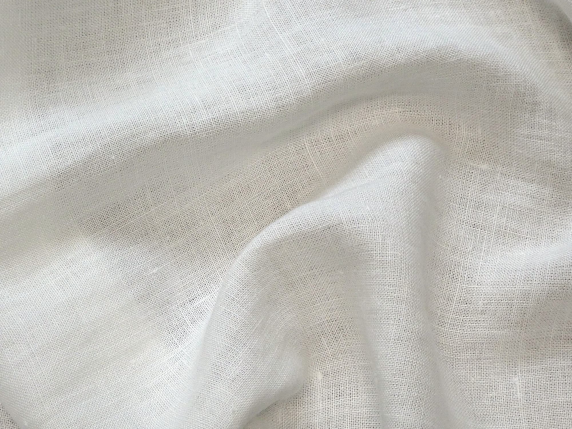 Close-up of Alder hemp fabric in ivory showing weave