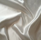 Close-up of ivory Glint hemp and silk fabric with subtle texture