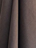 Close-up of Dama Chocolate brown hemp fabric with texture