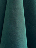 Close-up of Dama teal hemp fabric with a textured surface