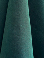 Close-up of Dama teal hemp fabric with a textured surface