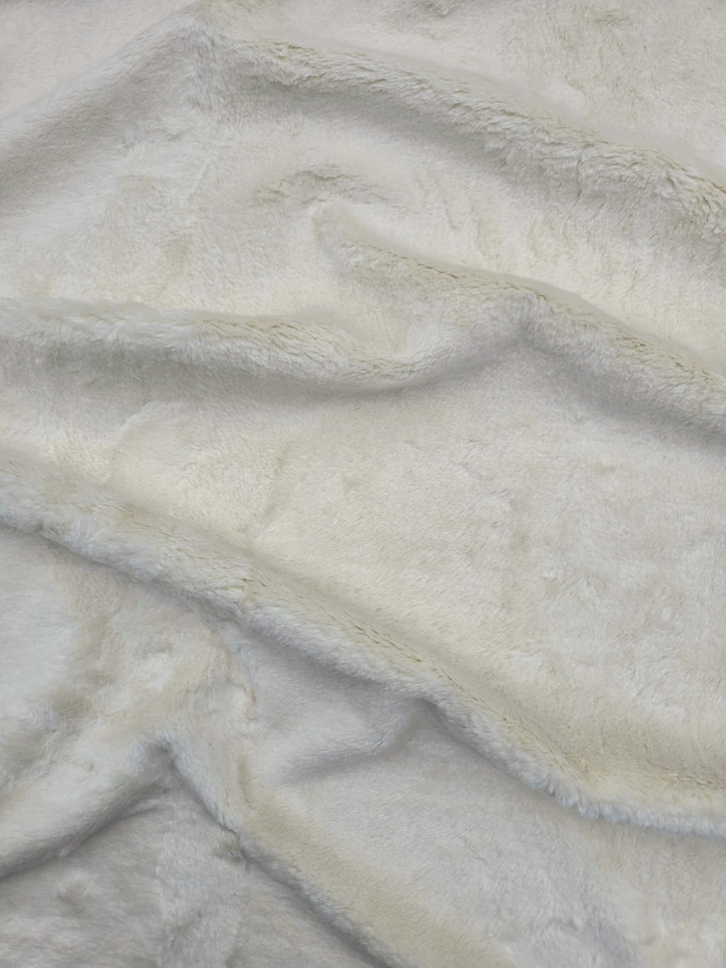 Cosmos faux fur hemp fabric in cream close up