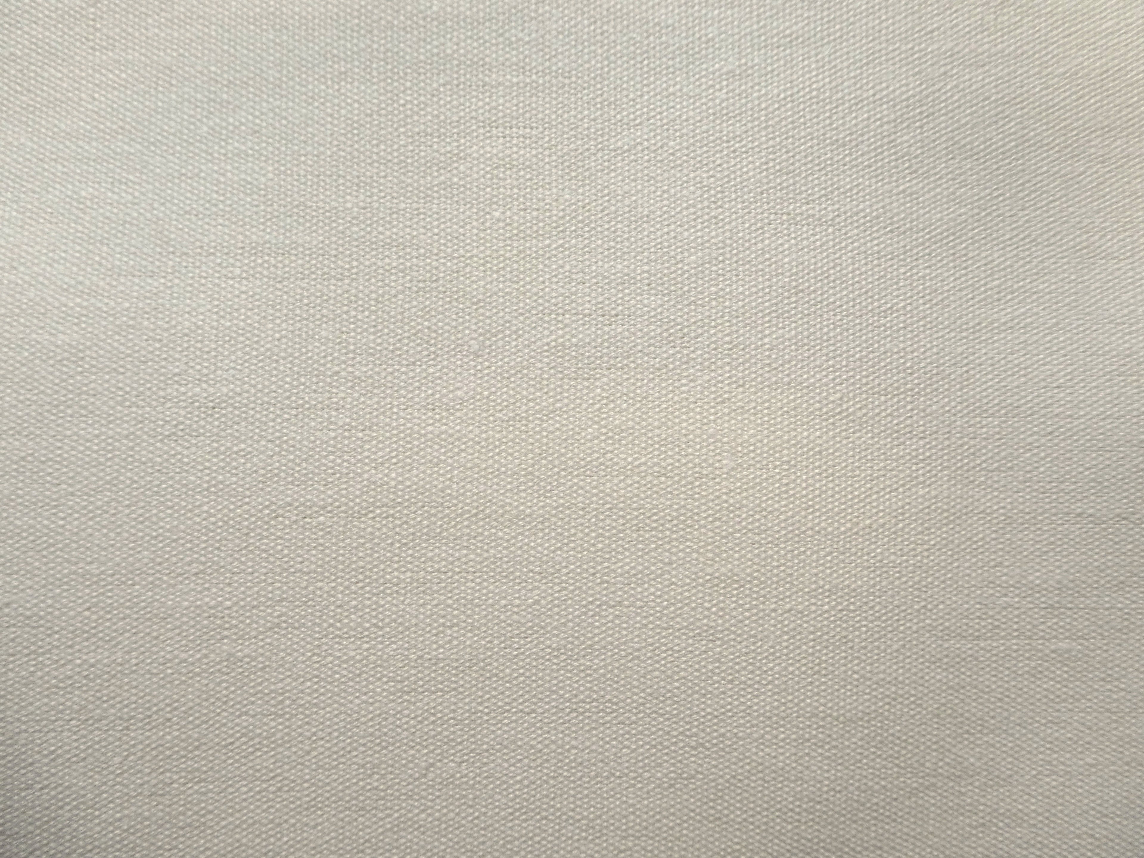 Tarn hemp fabric close up laid flat in cream