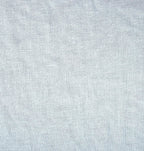 close up swatch of Linden Hemp fabric in ivory showing weave