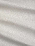 Close-up of ivory meadow hemp and cotton fabric with subtle texture